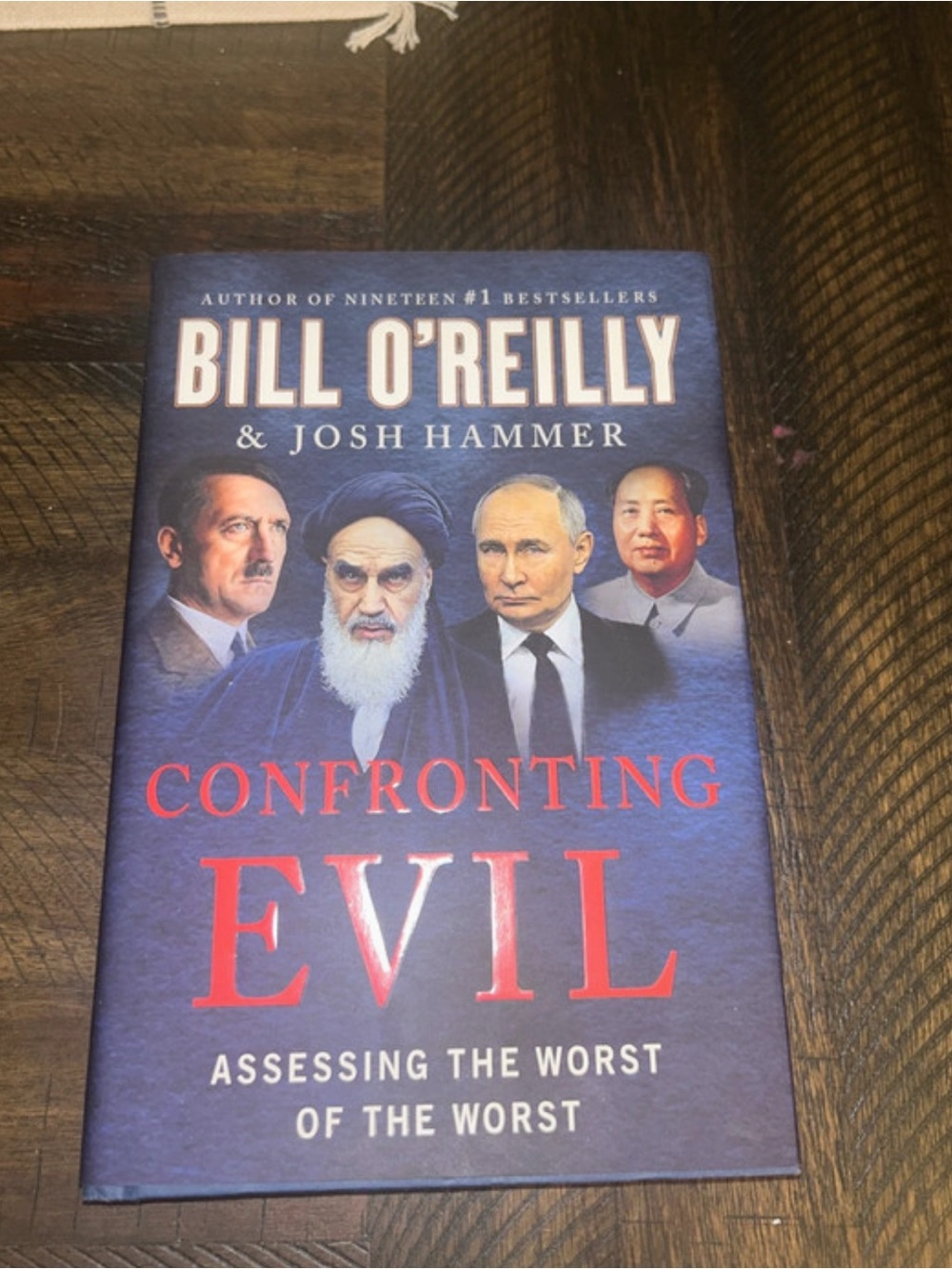 Confronting Evil Hardback Book